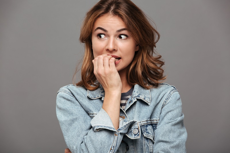 Close,Up,Portrait,Of,A,Worried,Teenage,Girl,In,Denim